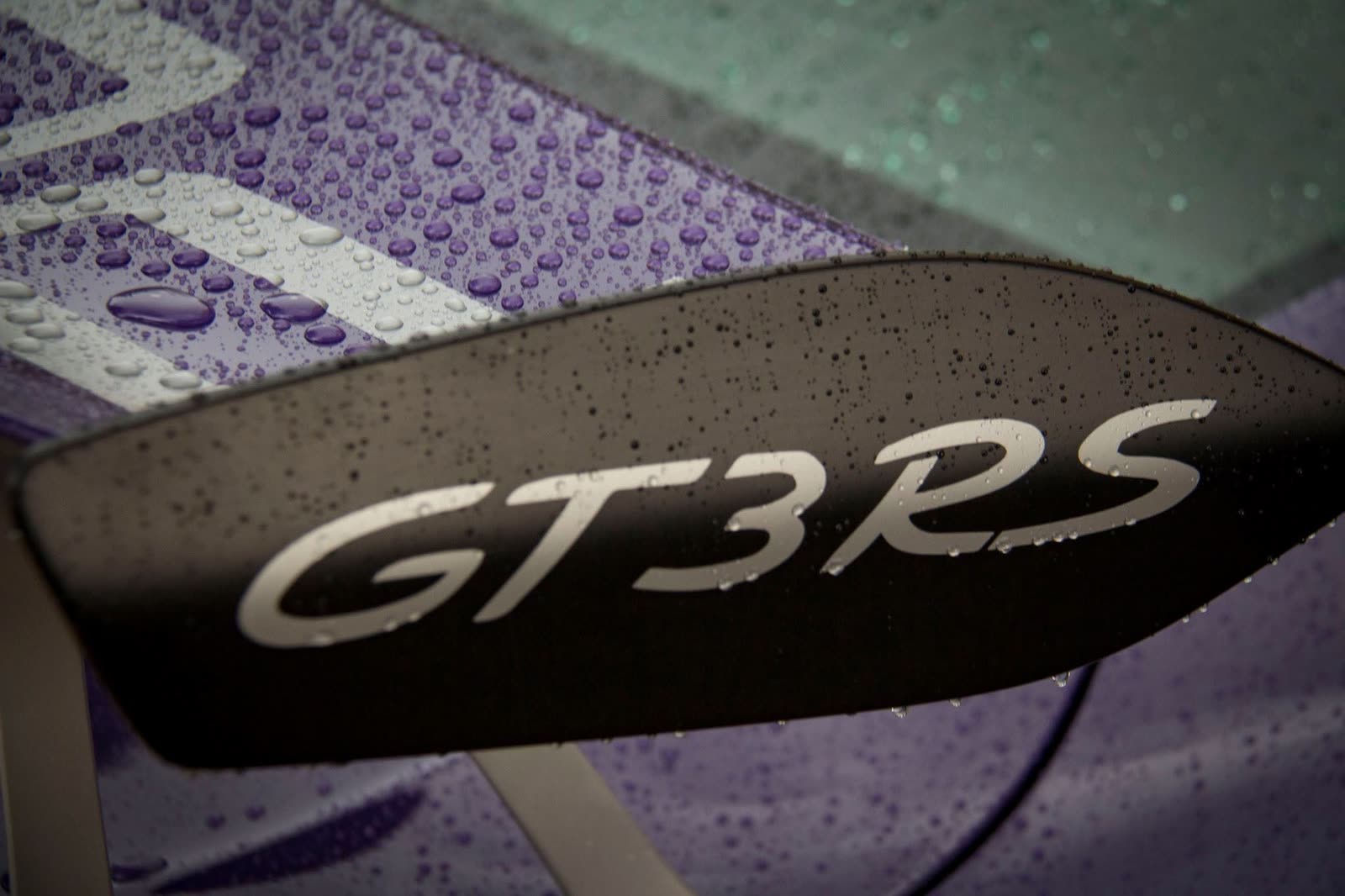 Water beading on the coated wing of a Porsche GT3 RS