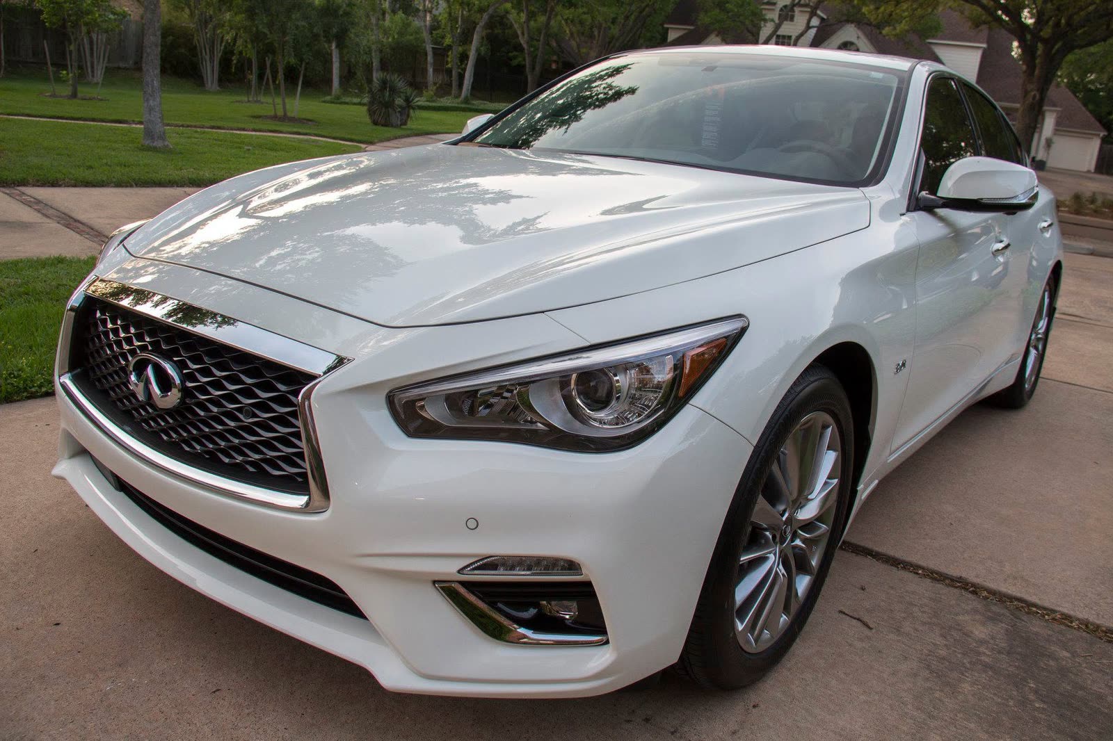A white Infiniti Q50