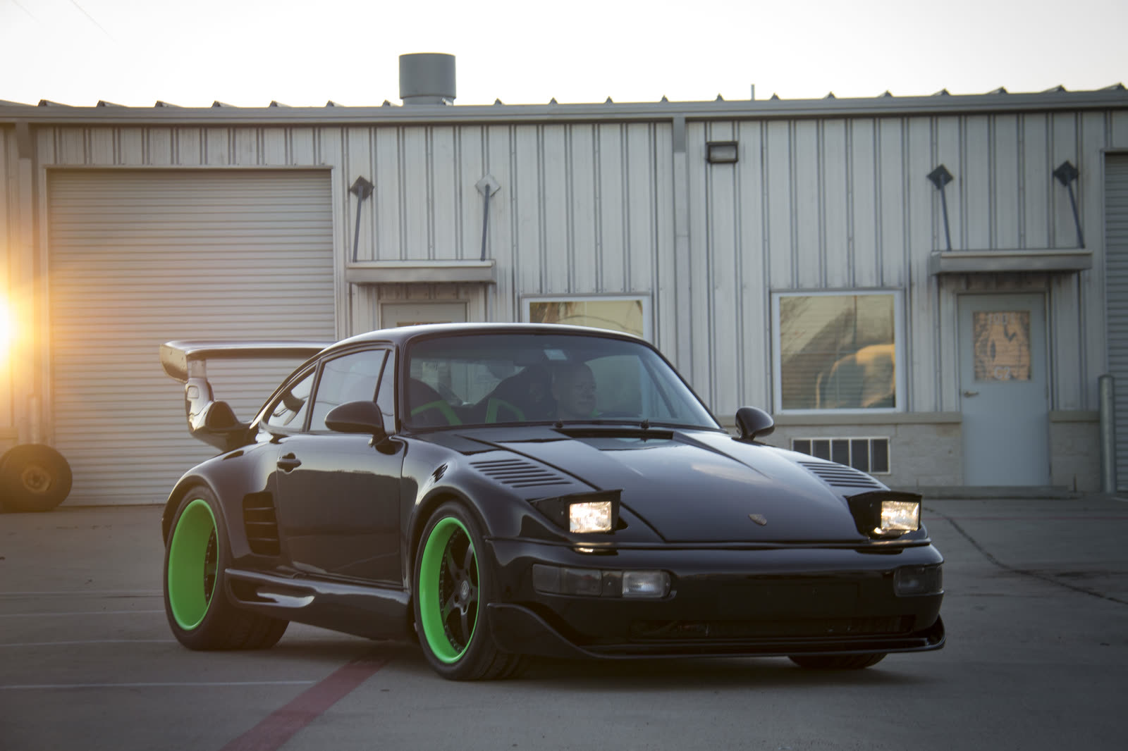 A black Porsche 911 slant nose